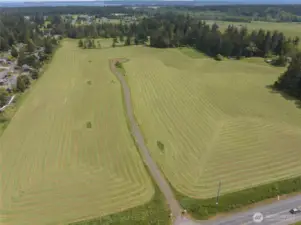 Your agricultural dream awaits! This 33-acre prime farmland offers immediate income potential, currently leased for hay, and is intelligently divided into 7 parcels for ultimate flexibility. Essential utilities are already installed, making it a truly turn-key opportunity.