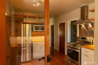 New doors give the kitchen natural light and invitation to come on in.
