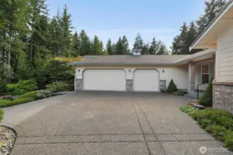 Three car garage with extended turn around space for backing up or parking in garage
