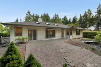 Back patio with mature landscaping and privacy