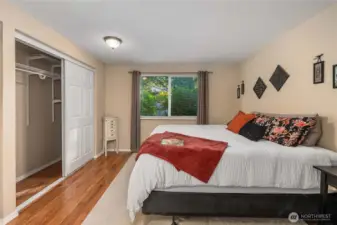 The second closet is hiding behind the door on the left, both closets are similar in size