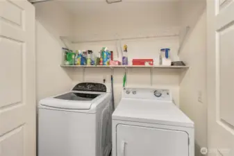 Laundry is located in the main hallway concealed behind accordion doors.