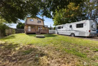 Backyard area with RV parking and storage—lots of potential!