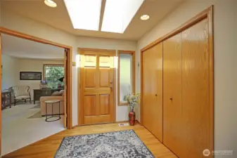 Grand entry with skylights and oversized closets.