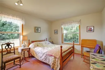 Large second bedroom with privacy and large closet.