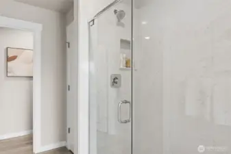 Marble surround shower. Photo's are for representational purposes only. Colors and finishes may differ.