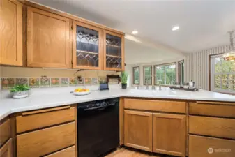 Open to the bonus room and casual dining area, this kitchen is perfect for entertaining. The door to the covered deck is to the right of this picture.