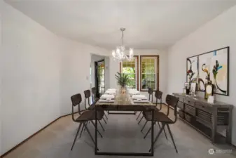 Virtually staged formal dining room.