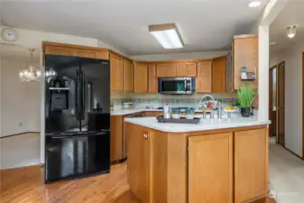 Efficient kitchen has plenty of cabinets and counter space!
