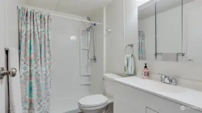 Spacious 3/4 guest bath is light and bright creating the perfect space to get ready.