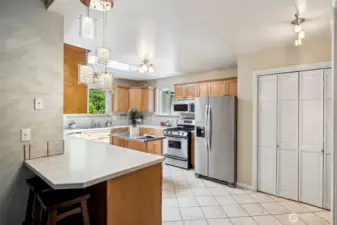 2nd Home - Spacious kitchen with eating bar.