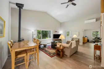 2nd Home - Living room shows ceiling fan and stove.