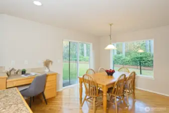 Super-sized kitchen nook with a slider to the back patio.