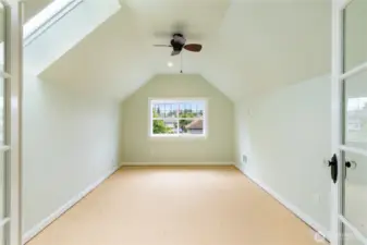 2nd floor perfect room for crafts, office or play room. Skylight adds to this room light & bright feeling. All it needs is flooring to complete this perfect space.