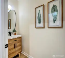1/2 bath on the main floor off the entry hallway