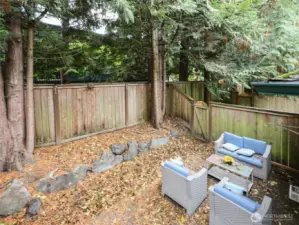 Sliding doors lead to a private, fully FENCED YARD with patio perfect for entertaining, or BBQs.