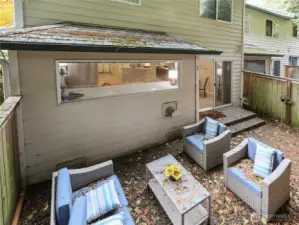 Sliding doors lead to a private, fully FENCED YARD with patio perfect for entertaining, or BBQs.
