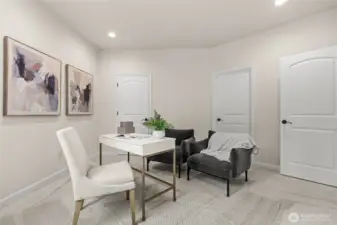 Offering some extra storage, this home office is paired with it's very own closet space.