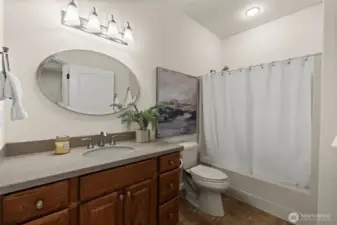 This beautiful shared bathroom is great for guests and/or household residents.