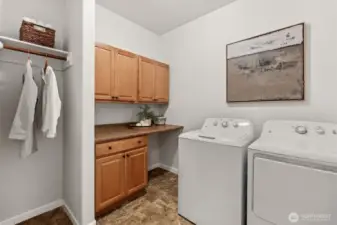 Organize and clean with ease in this awesome laundry room.