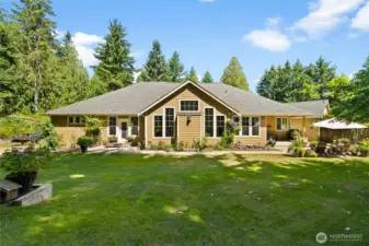 Escape to this private, serene backyard perfect for hosting, entertainment, or simply to settle in and relax.