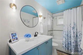 Updated bathroom featuring stylish finishes and a soaking tub, thoughtfully designed for relaxing and everyday convenience.