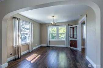 Wall of windows in this space creates abundance of natural light. Quaint dining space.