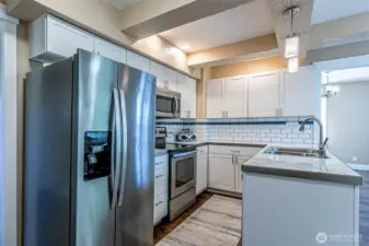 Updated appliances, cabinets and counter tops.