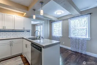 Small nook in kitchen and adjoining dining room.