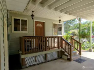 convenient covered deck/ kitchen entrance from carport