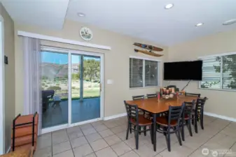Dining area leading out to the covered deck where you will spend most of your time if not at the sandy beach.