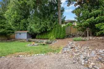 No homes looking right at you from the backyard, so private. Cute shed too.