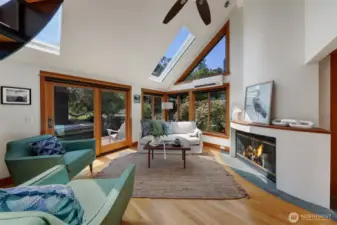One of our favorite features of this home is the curved wall where the fireplace takes a beautiful centerpiece to the room.