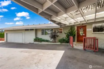 2 car garage with covered carport entrance