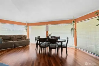 Dining area with floor to ceiling natural light