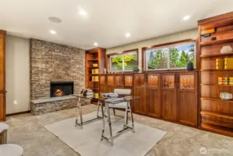 HUGE downstairs family room, 2nd wood burning fireplace.
