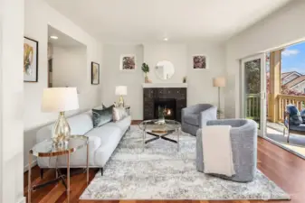 One level up is the main level of the home, featuring a living room, kitchen, den/office, and powder room. The living room has great natural light, newly refinished cherry hardwood floorings, a gas fireplace, and access to a terrific covered deck.