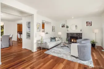 An angle highlighting the orientation of the living room to the kitchen. The pass-through ensures the ones preparing the meals are still a part of things.