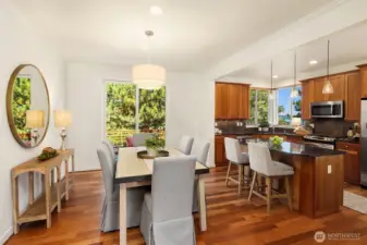 The eating area is generous, with enough room for a sideboard or hutch. The newly refinished hardwood floors are absolutely stunning.