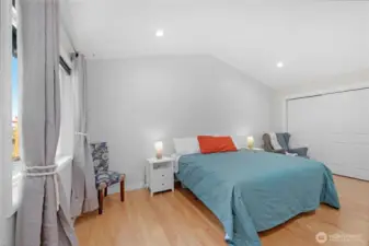 Large Primary Bedroom. Freshly painted with new LED lighting. Her closet with his in the bathroom.