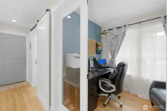 Home Office - with french doors allowing natural light in from the front window