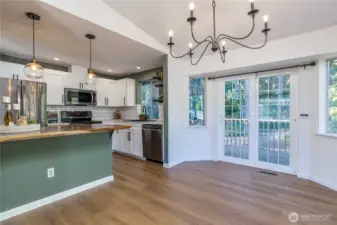 Dining room has slider to back deck