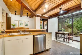 Lovely nook area in the kitchen looks over rear patio.