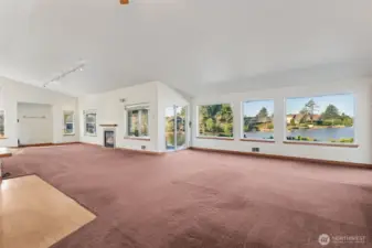 Large living room/family room/dining area all giving way to canal views