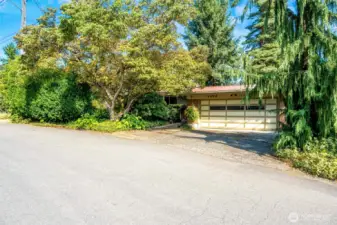 Tucked away on a private dead-end street in Seattle’s desirable Victory Heights neighborhood.