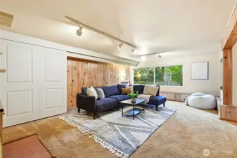 The lower-level rec room adds exceptional flexibility—perfect for gatherings, hobbies, workouts, or guest quarters.