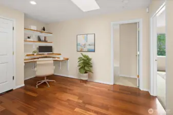 Virtually staged. Large 2nd floor loft with built-in desk - perfect work from home space!