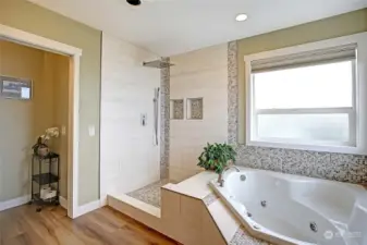 Owner's suite shower has custom glass wall/door surround on order (will be installed very soon). Separate water closet and a huge jetted tub ~ with a view!