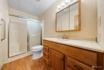Second bedroom with walk-in shower includes two built-in seats a great way to relax.