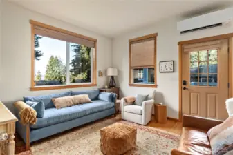 Views to the water from the living room. This charming home also boasts a newer mini-split heat pump.